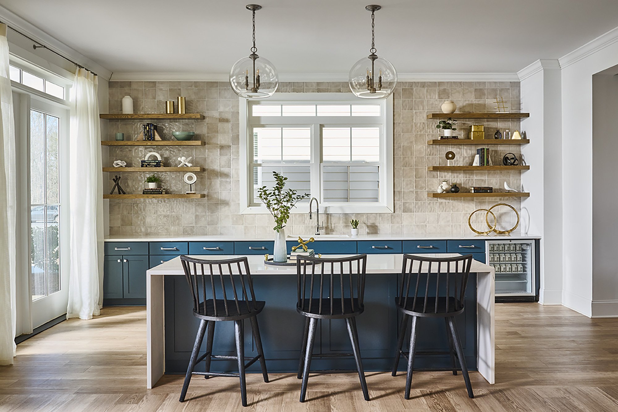 BTR kitchen blue cabinets and white backsplash