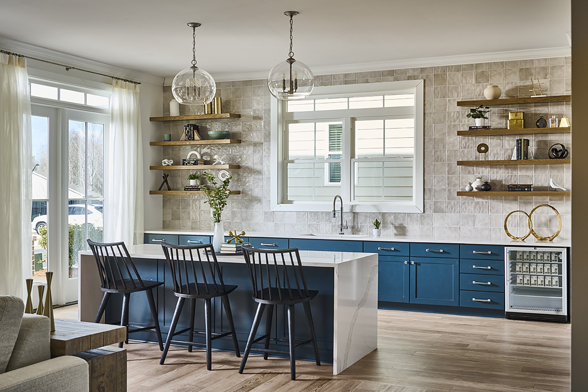 BTR kitchen blue cabinets and white backsplash